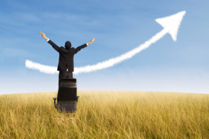 Happy businessman and growing chart cloud outdoor